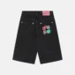 Shorts Badges Jorts de Cold Culture en Black Licorice, vista trasera con parches gráficos en el bolsillo