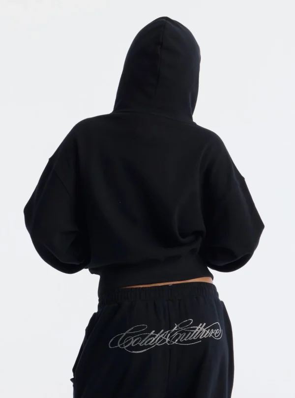 Vista trasera de la sudadera negra Bling de Cold Culture para mujer, con capucha, hombros caídos y corte holgado.