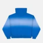 Vista trasera de la sudadera Crossed azul de Cold Culture, con capucha, hombros caídos y efecto degradado en tonos azules.