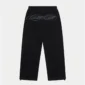 Vista trasera de los pantalones deportivos Curve negros de Cold Culture para mujer, con logotipo gris en la parte superior y bajos ajustables.