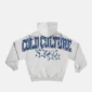 Vista trasera de la sudadera con capucha Fourth Of July de Cold Culture en gris jaspeado, con estampado grande de letras azules y estrellas con detalles rojos.