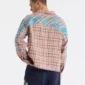 Modelo con camisa Gleenwood Plaid Tartan rosa de Cold Culture en vista trasera de tres cuartos, con logotipo turquesa sobre el estampado de cuadros.