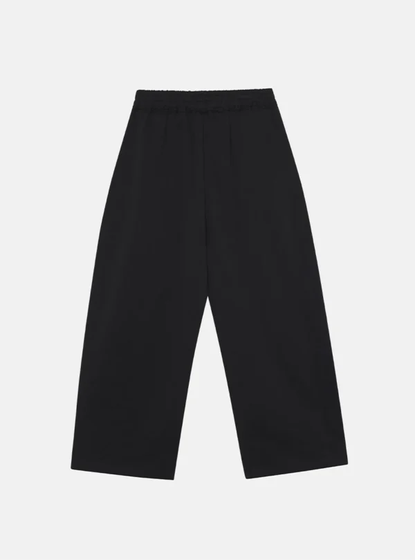 Vista trasera de los pantalones deportivos negros Cold Culture Midnight Set de pernera ancha