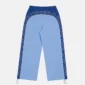 Vista trasera de los pantalones deportivos Overcut de Cold Culture en azul claro y azul oscuro, con estampado CULTURE COLD alrededor de la parte superior y los laterales, cintura elástica y bajos ajustables.