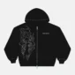 Vista frontal de la sudadera Raw Zip-up Hoodie negra de Cold Culture, con cremallera, gráfico de líneas blancas y detalles metálicos en capucha y puños.