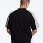 Detalle trasero de la camiseta Cold Culture Speed Spoke Black & Heather Grey con panel negro y mangas grises