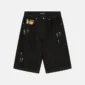 Bermudas Toxic de Cold Culture en Black Denim, vista frontal con detalles desgastados y bolsillo con aplicación de cuadros
